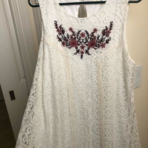 Mid length white shift dress